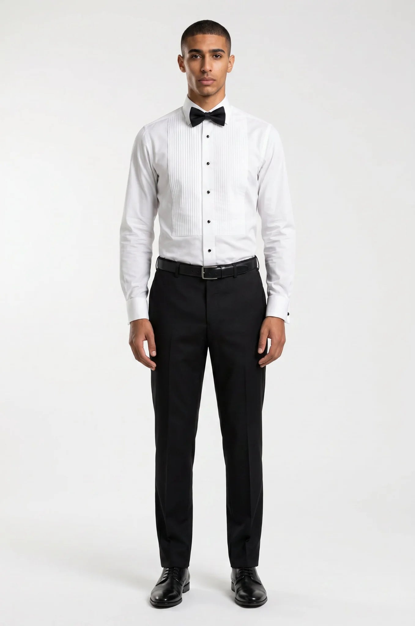 Blutailor white pleated tuxedo shirt in premium fabric with a custom tailored fit, featuring elegant pleat detailing and a crisp finish for a refined formal look.